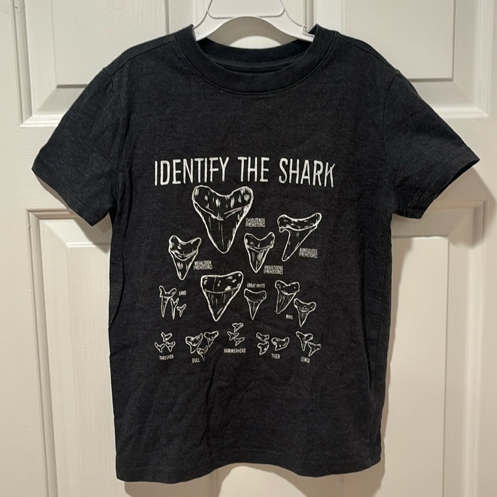 Boys dark gray tshirt size small (6-7) with different shark teeth pictures